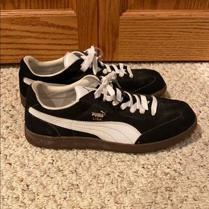 Puma Liga black suede sneakers.